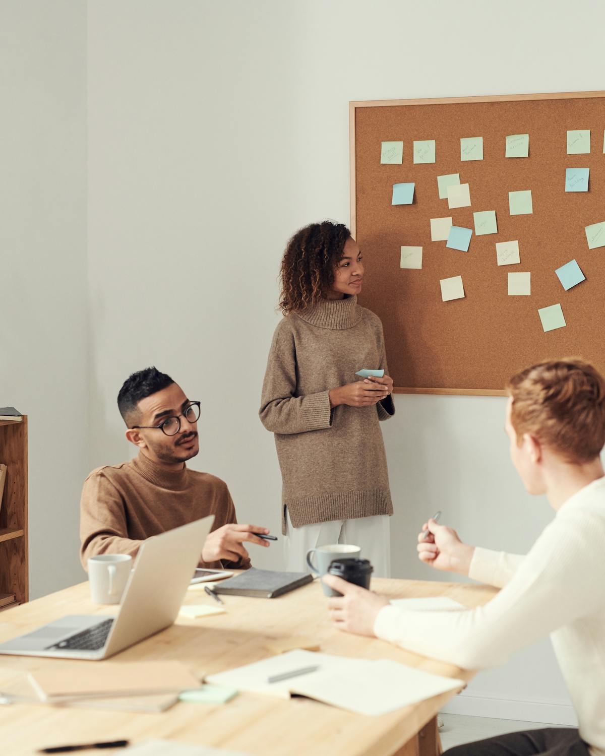 Agency team collaborating in a modern studio